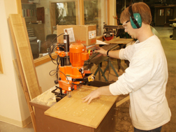 E. Leet Woodworking modern equipment.