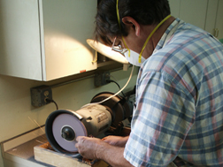 Hand grinding our own cutters.