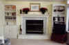 White Fluted Fireplace Mantle & Book Shelves